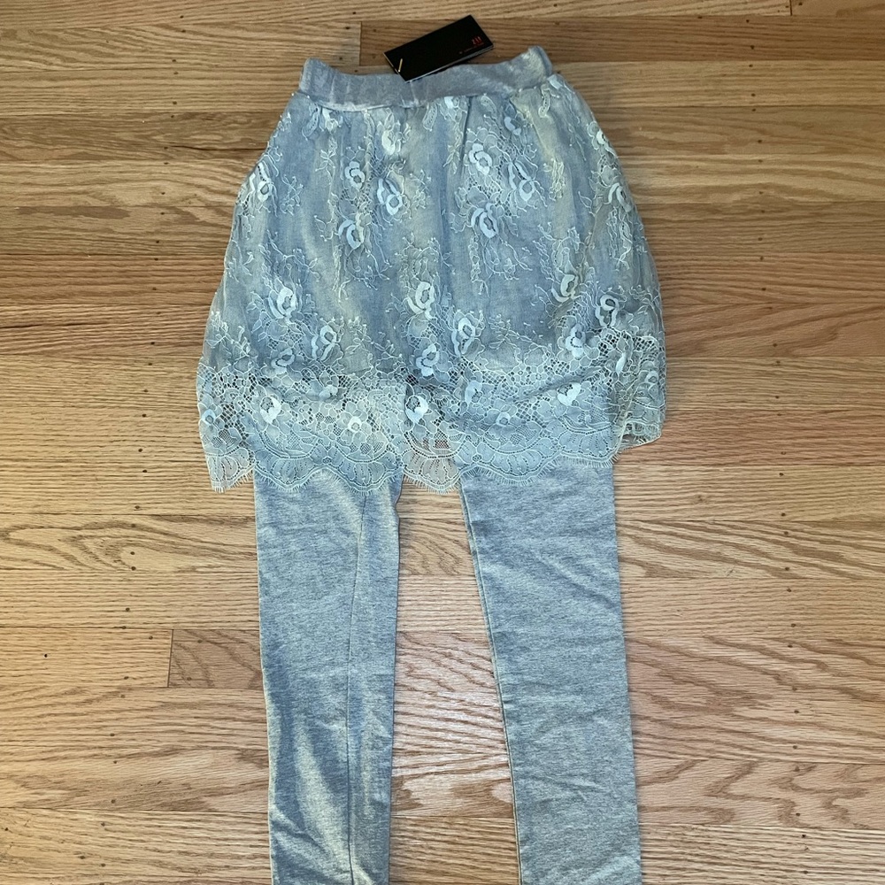 Girls pants with lace skirt. Size small.